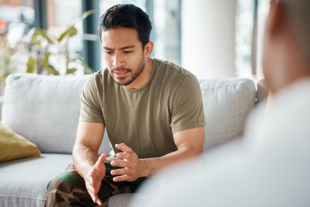 trauma counseling PSTD, Man soldier and man giving therapy for trauma counseling